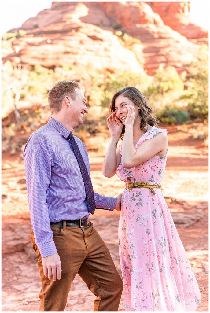 Woman crying after getting engaged in Sedona at Bell Rock