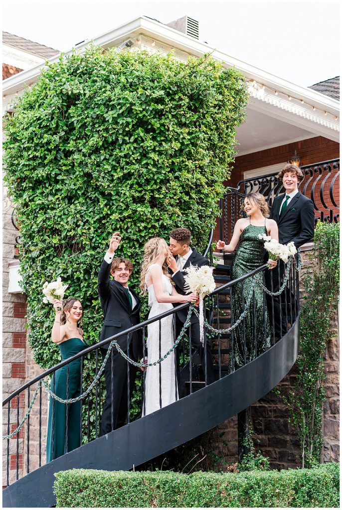 Wedding party on stairs at Stonebridge Manor wedding venue in Mesa, Arizona