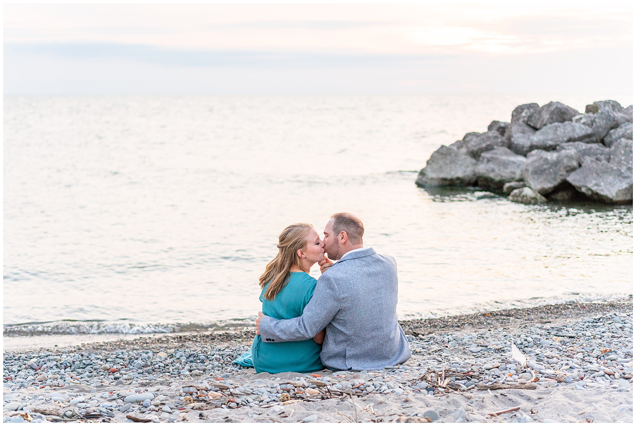 Romantic formal engagement portraits at Sims Park beach in Cleveland Ohio